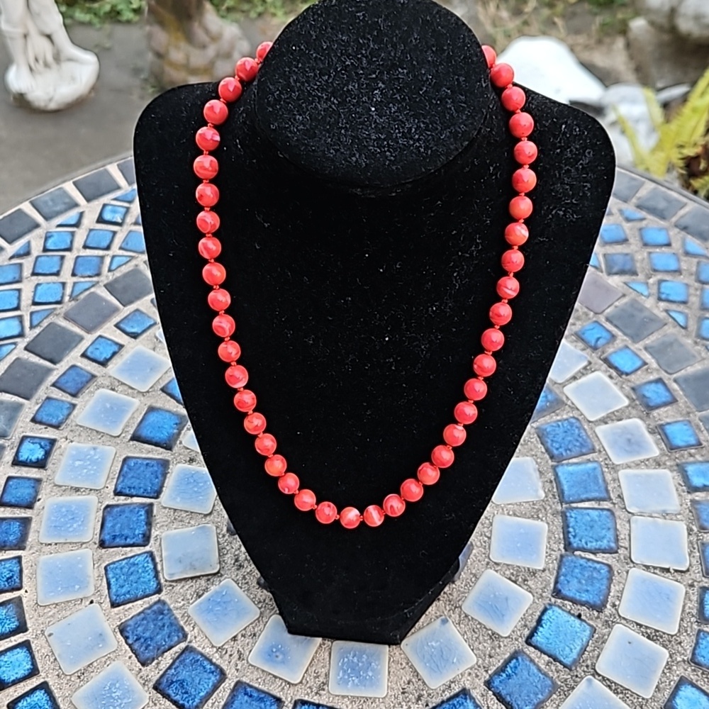 Vintage Red Swirled Beaded Necklace. Hand Knotted. Clasp worn.